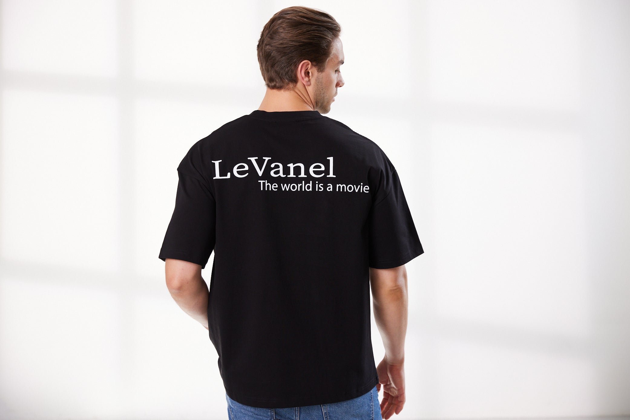 Men's oversized shirt black - The world is a movie